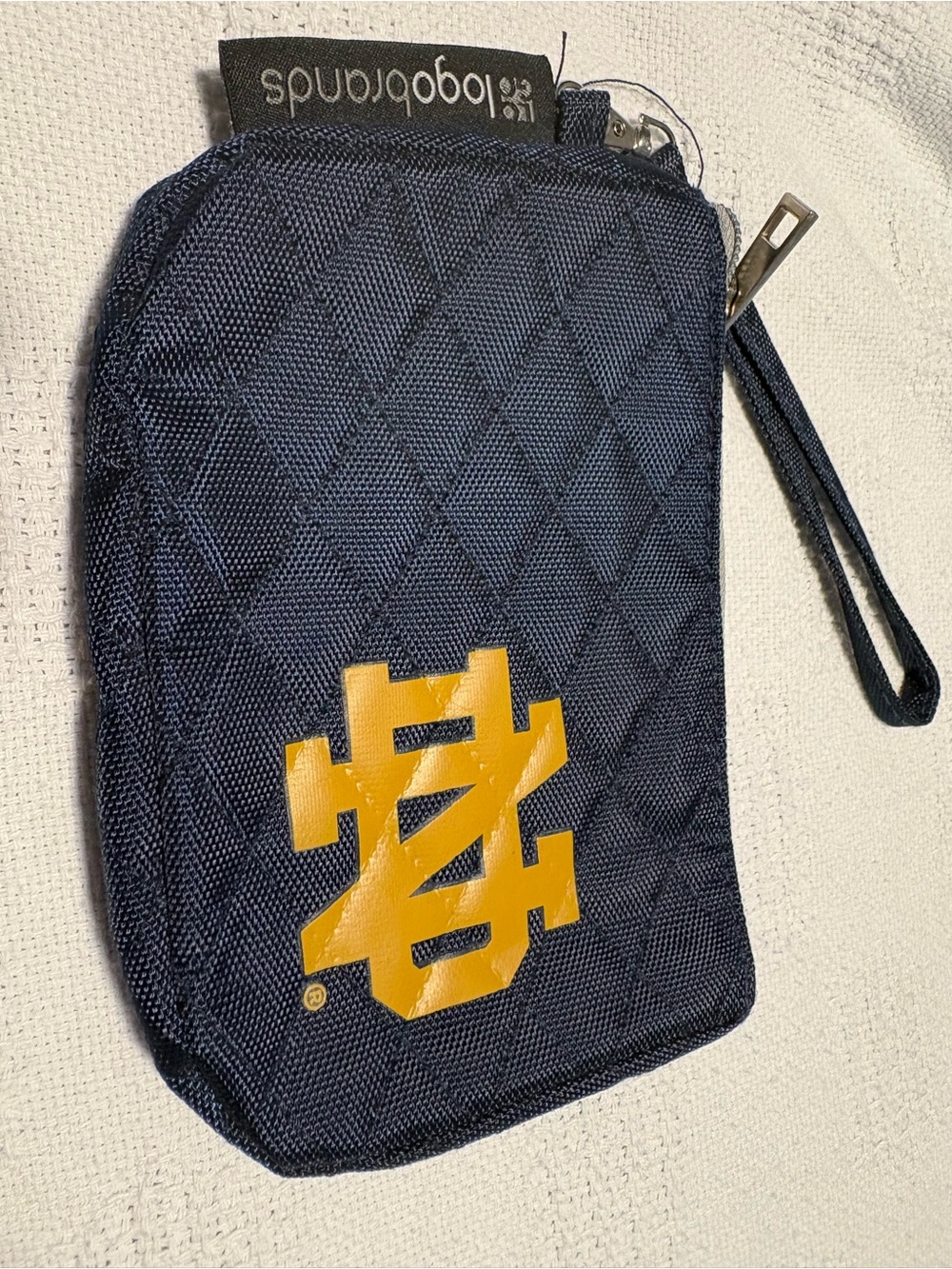 Navy Quilted Wristlet Pouch with Yellow Logo Accent